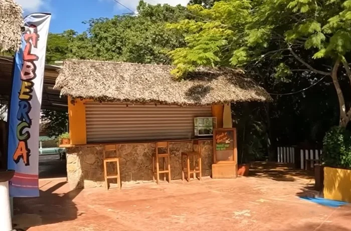 entrada alberca cenote xcajum